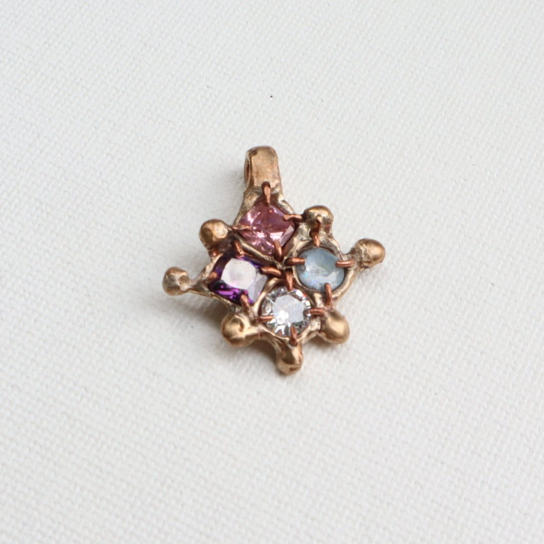 030 Bronze Melting Star Pendent