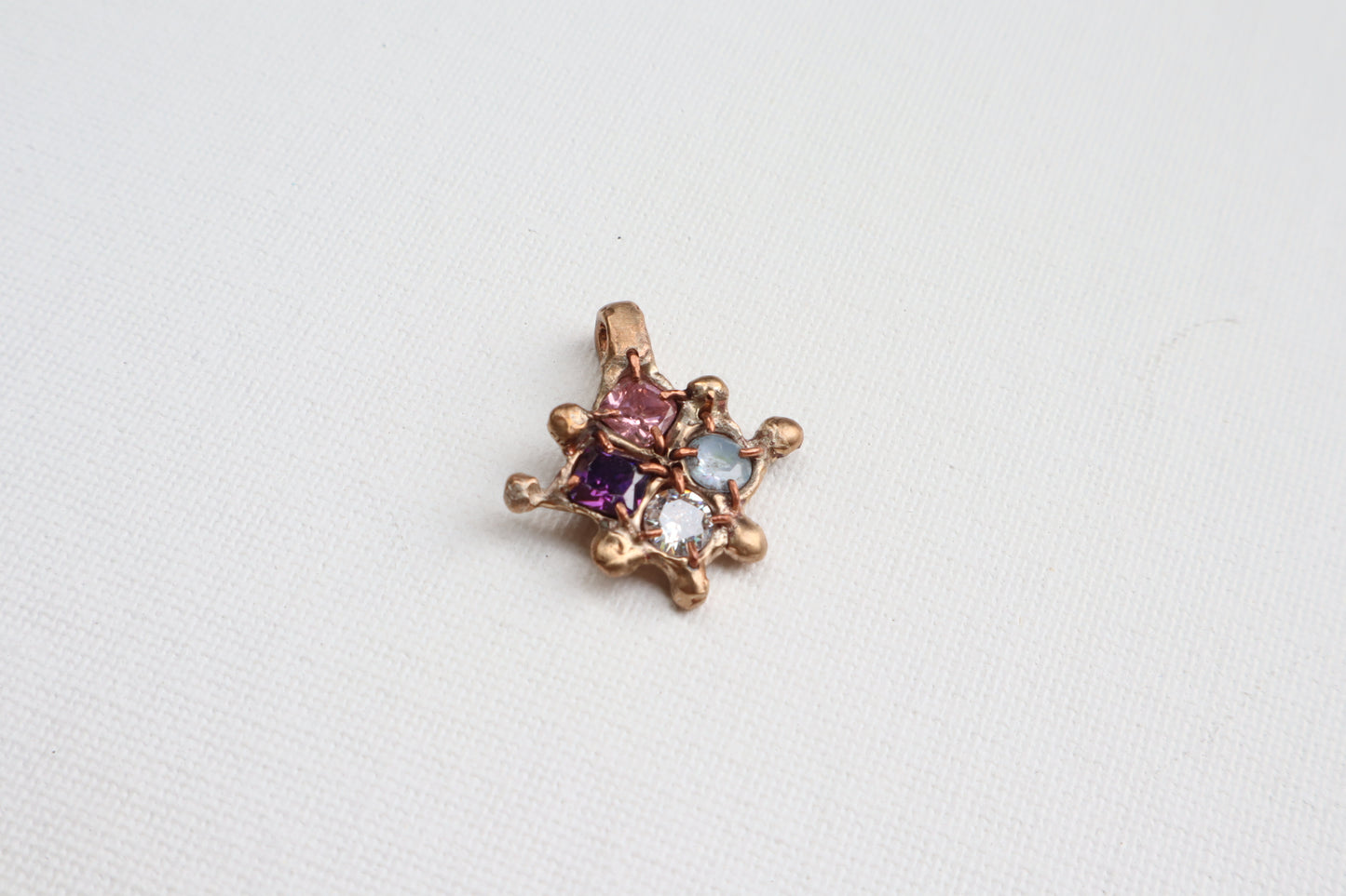 030 Bronze Melting Star Pendent