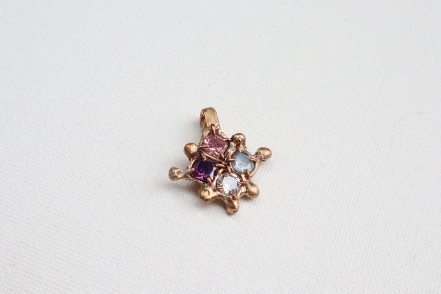 030 Bronze Melting Star Pendent